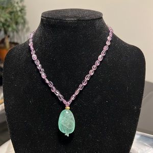 Purple Amethyst neck am with with fluorite pendent.